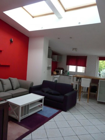 La cuisine, le salon et la salle à manger sont disposés en enfilade. Pas de cloison, on est toujours ensemble.